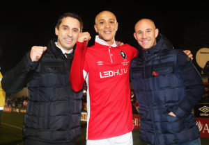 SALFORD, ENGLAND - NOVEMBER 06:  Joint Salford City owners Gary Neville (L) and Nicky Butt (R) celebrate victory with goalscorer Richie Allen of Salford City after the Emirates FA Cup first round match between Salford City and Notts County at Moor Lane on November 6, 2015 in Salford, England.  (Photo by Chris Brunskill/Getty Images)