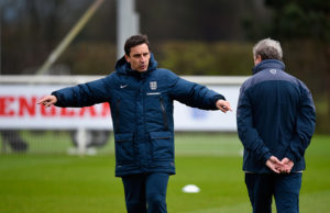 ENFIELD, ENGLAND - MARCH 26: First Team Coach Gary Neville of England (L) talks to Manager Roy Hodgson of England during an England training session ahead of the Euro 2016 qualifier against Lithuania at Enfield Training Centre on March 26, 2015 in Enfield, England.  (Photo by Mike Hewitt/Getty Images)