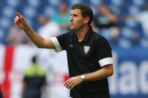 GELSENKIRCHEN, GERMANY - AUGUST 03: Head coach Javi Gracia of Malaga issues instructions during the match between FC Malaga and West Ham United as part of the Schalke 04 Cup Day at Veltins-Arena on August 3, 2014 in Gelsenkirchen, Germany.  (Photo by Christof Koepsel/Bongarts/Getty Images)