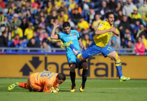 LAS PALMAS, SPAIN - FEBRUARY 20: Luis Suarez of FC Barcelona takes on Pedro Bigas and Javi Varas of UD Las Palmas during the La Liga match between UD Las Palmas and FC Barcelona at Estadio Gran Canaria on February 20, 2016 in Las Palmas, Spain. (Photo by Denis Doyle/Getty Images)