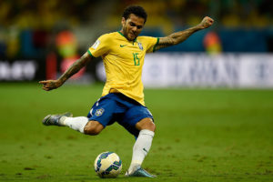 SALVADOR, BRAZIL - NOVEMBER 17: Daniel Alves of Brazil controls the ball during a match between Brazil and Peru as part of 2018 FIFA World Cup Russia Qualifiers at Arena Fonte Nova on November 17, 2015 in Salvador, Brazil. (Photo by Buda Mendes/Getty Images)