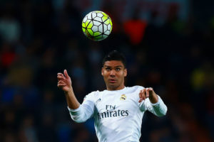 MADRID, SPAIN - APRIL 20: Carlos Casemiro of Real Madrid CF saves on a header during the La Liga match between Real Madrid CF and Villarreal CF at Estadio Santiago Bernabeu on April 20, 2016 in Madrid, Spain.  (Photo by Gonzalo Arroyo Moreno/Getty Images)