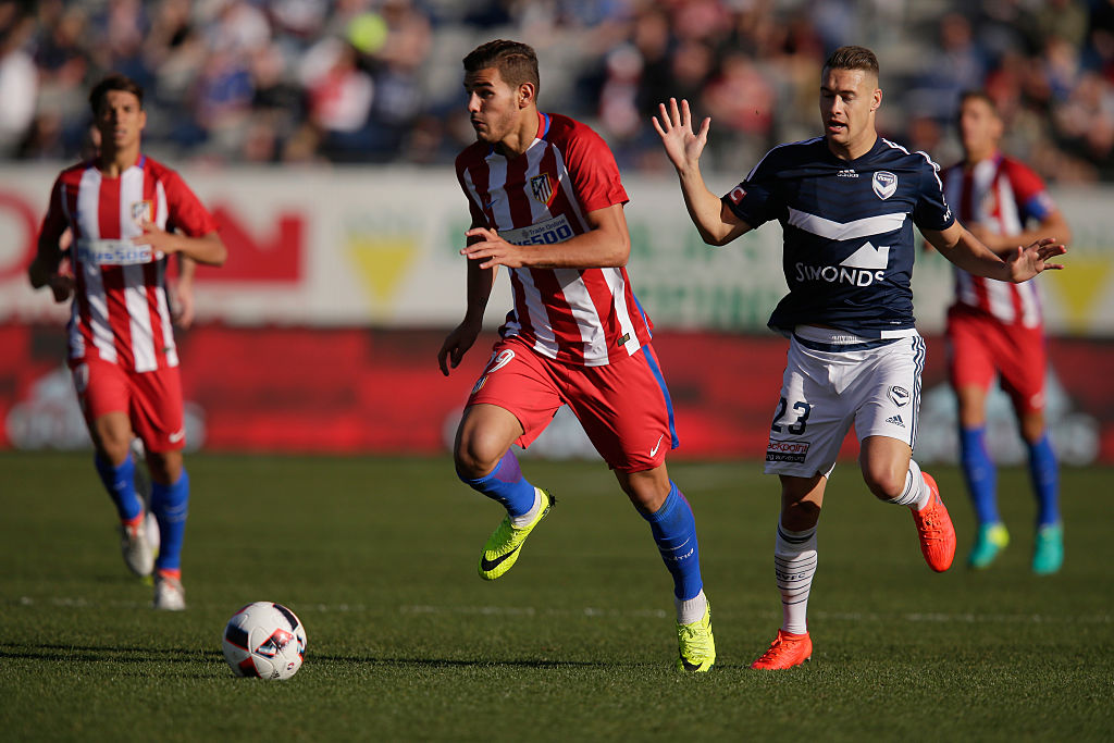 GEELONG, AUSTRALIA - JULY 31: Theo Hernandez of Atletico Madrid runs with the ball during the match between Melbourne Victory and Atletico de Madrid at Simonds Stadium on July 31, 2016 in Geelong, Australia. (Photo by Darrian Traynor/Getty Images)