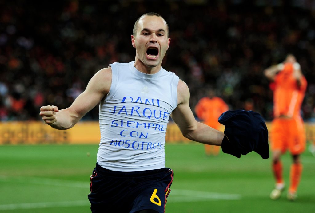 JOHANNESBURG, SOUTH AFRICA - JULY 11: Andres Iniesta of Spain celebrates scoring his side's first goal during the 2010 FIFA World Cup South Africa Final match between Netherlands and Spain at Soccer City Stadium on July 11, 2010 in Johannesburg, South Africa. (Photo by Jamie McDonald/Getty Images)