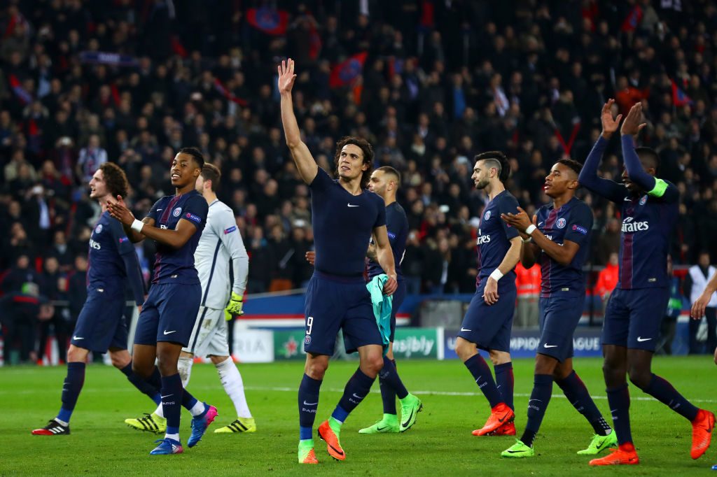 PARIS, FRANCE - FEBRUARY 14:  Edinson Cavani of Paris Saint-Germain waves to the fans next to his team-mates following their victory in the UEFA Champions League Round of 16 first leg match between Paris Saint-Germain and FC Barcelona at Parc des Princes on February 14, 2017 in Paris, France.  (Photo by Clive Rose/Getty Images)