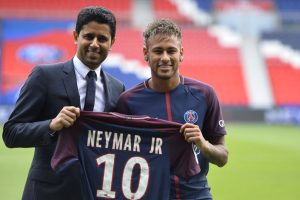 PARIS, FRANCE - AUGUST 04: Neymar poses with his new jersey next to Paris Saint-Germain President Nasser Al-Khelaifi after a press conference on August 4, 2017 in Paris, France. Neymar signed a 5 year contract for 222 Million Euro. (Photo by Aurelien Meunier/Getty Images)