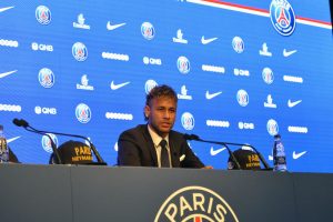 PARIS, FRANCE - AUGUST 04: Neymar reacts during a press conference with Paris Saint-Germain President Nasser Al-Khelaifi on August 4, 2017 in Paris, France. Neymar signed a 5 year contract for 222 Million Euro. (Photo by Aurelien Meunier/Getty Images)