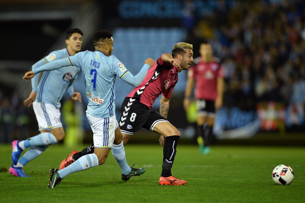 VIGO, SPAIN - FEBRUARY 02: Theo Bongonda of Celta de Vigo competes for the ball with Victor Camarasa of Alaves during the Copa del Rey semi-final first leg match between Real Club Celta de Vigo and Deportivo Alaves at Municipal de Balaidos stadium on February 02, 2017 in Vigo, Spain. (Photo by Octavio Passos/Getty Images)